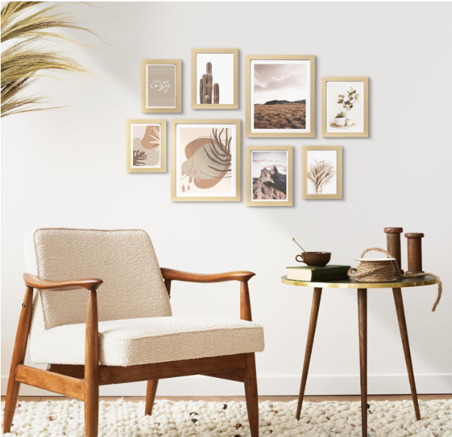 Neutral minimalist gallery wall art prints in wooden frames living room decor